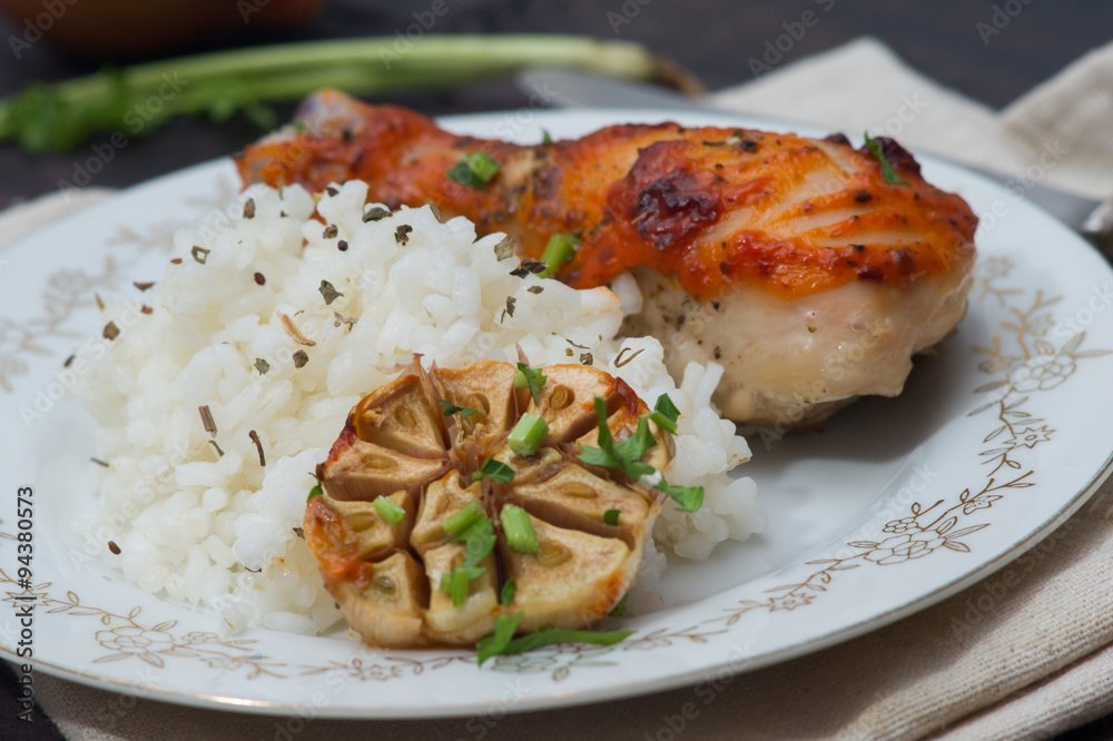 roasted chicken drumstick garnished with rice roasted chicken drumstick garnished with rice