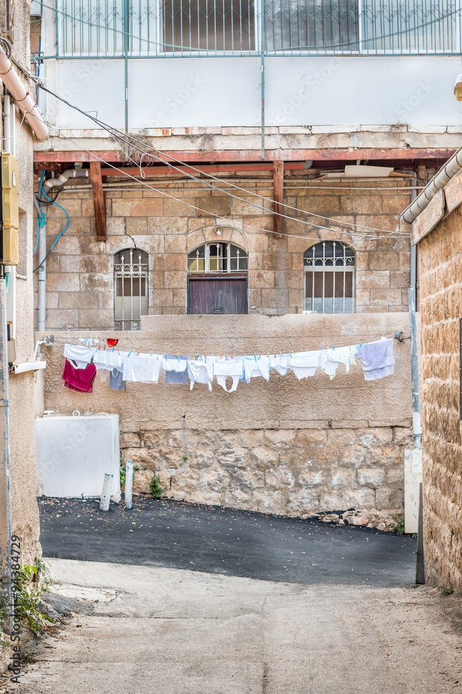 Laundry hanging to dry in an old city alley