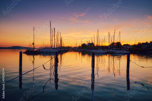Fototapeta Naklejka Na Ścianę i Meble -  Boats on dock sunset