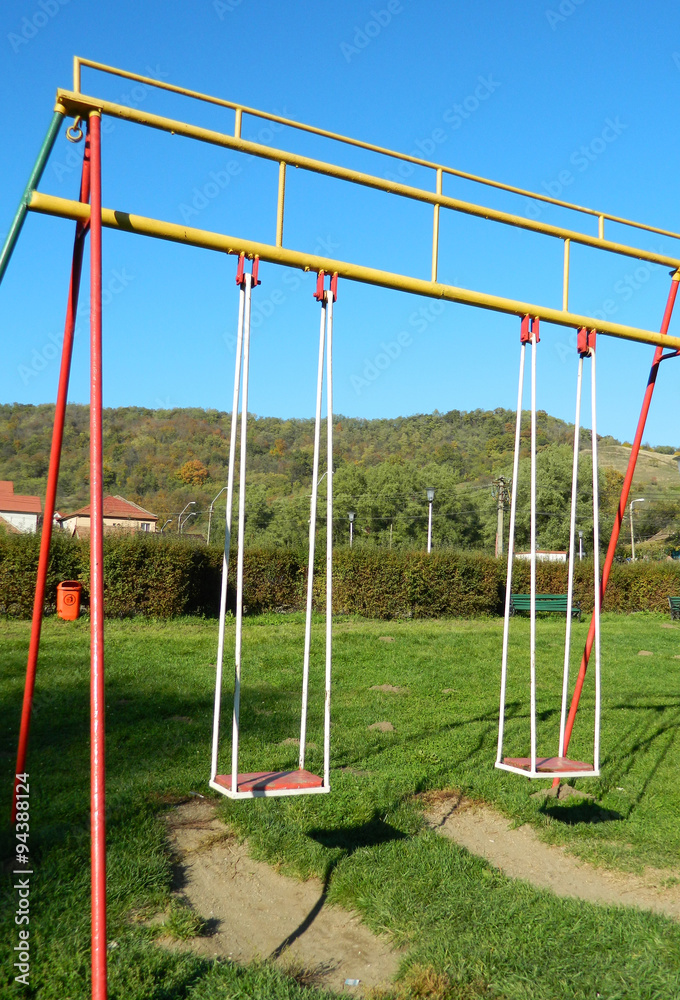 Swing in a park during the autumn season Swing in a park during the autumn season