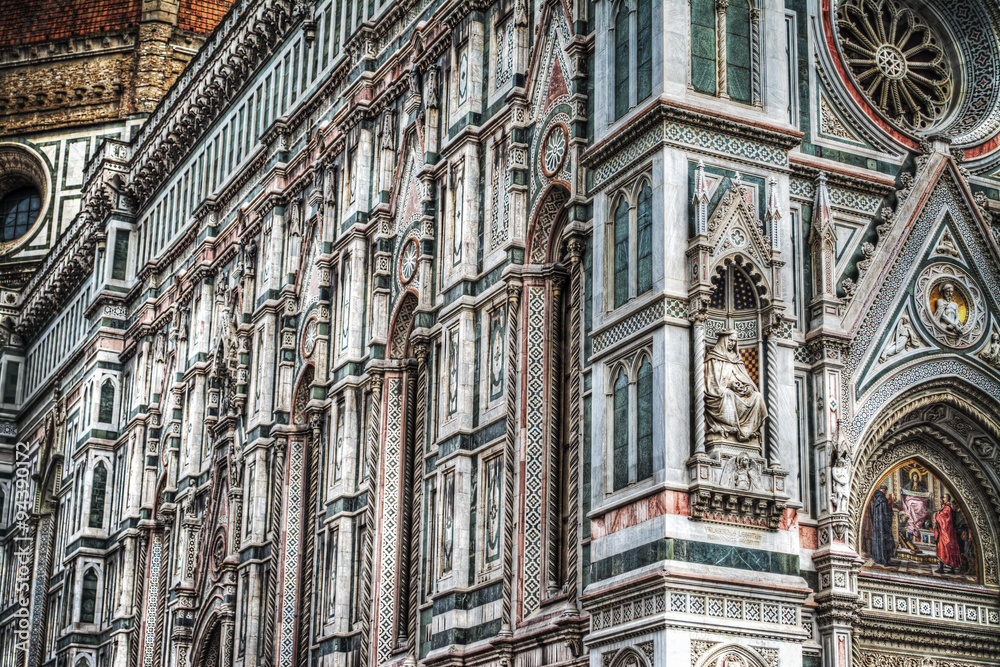 close up of Santa Maria del Fiore facade in Florence