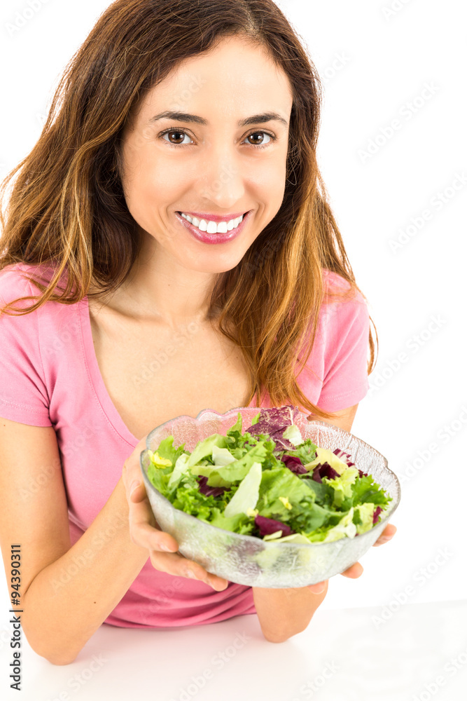 Weight loss woman showing a bowl of salad Weight loss woman showing a bowl of salad