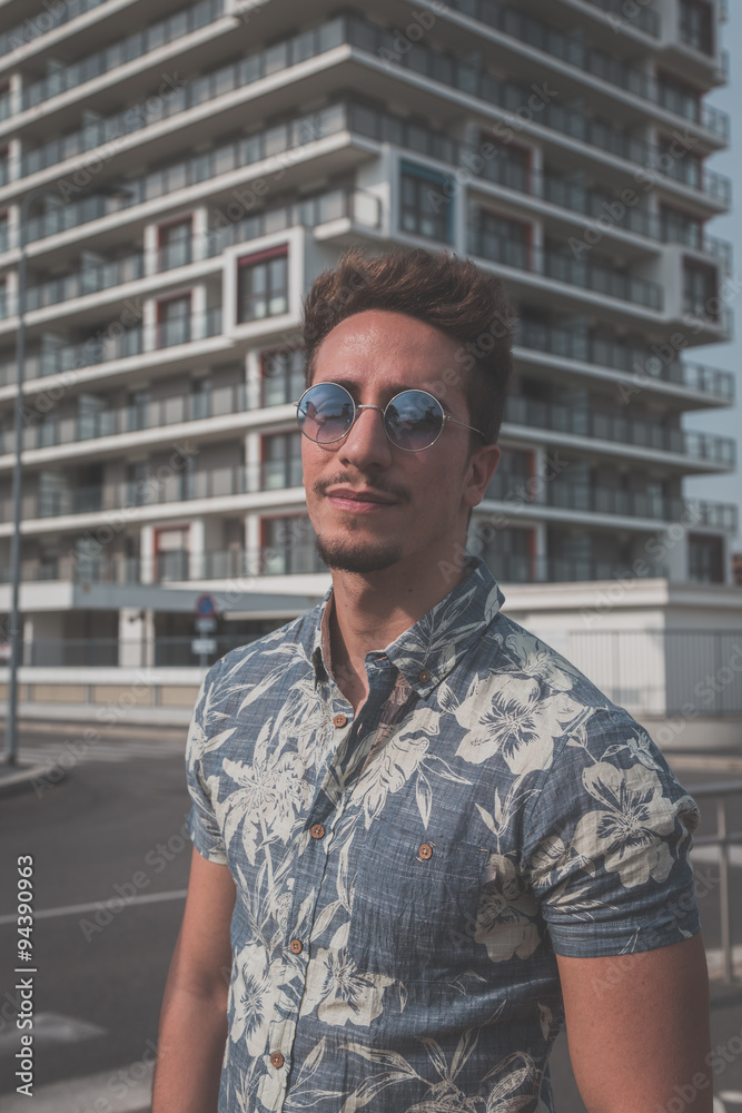Young handsome man posing in the street Young handsome man posing in the street