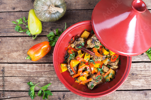 Moroccan Tagine with lamb, pumpkin and red pepper  photo