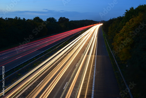 An Abstract light view of traffic on the M23 near London, Gatwick  at dusk in Autumn/Fall. photo