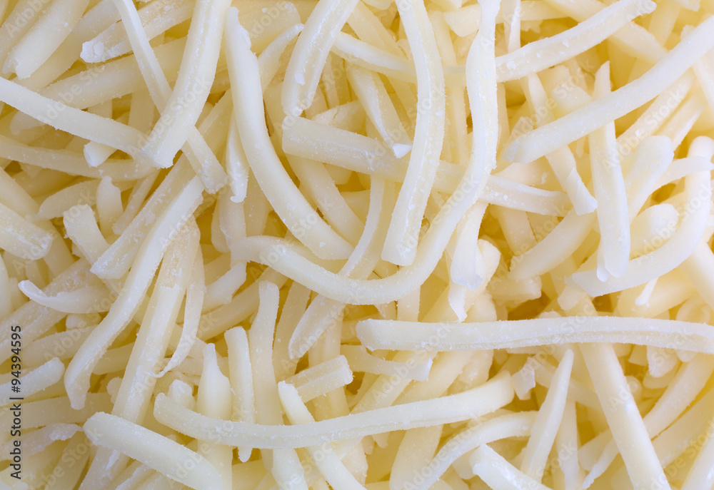 Close view of natural white mild cheddar cheese Close view of natural white mild cheddar cheese