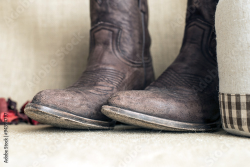 toes of brown cowboy boots with vintage look