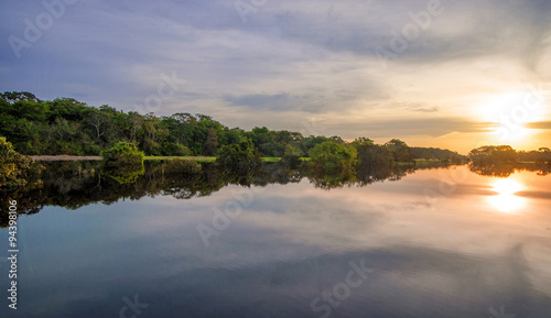 River in the Amazon Rainforest at dusk, Peru, South America