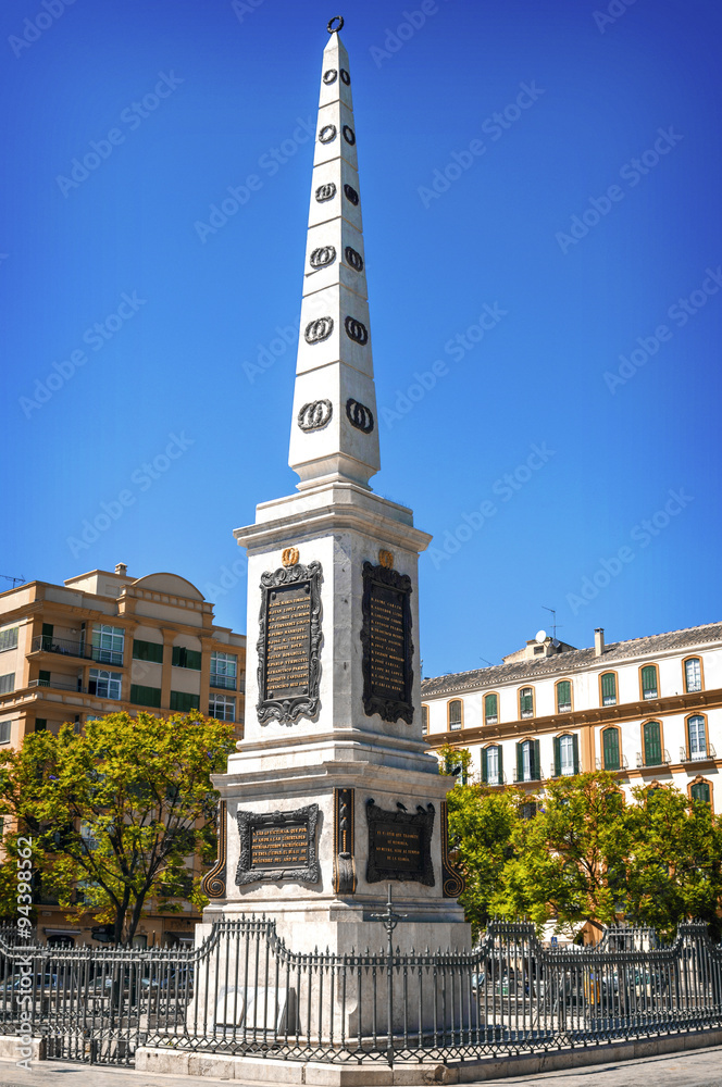 Obelisk on plaza de la Merced (Merced Square) in Malaga, Spain