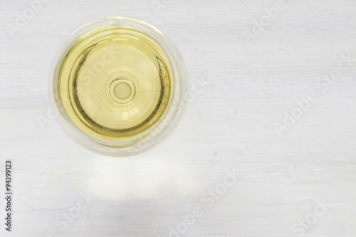 White wine glass on a white background