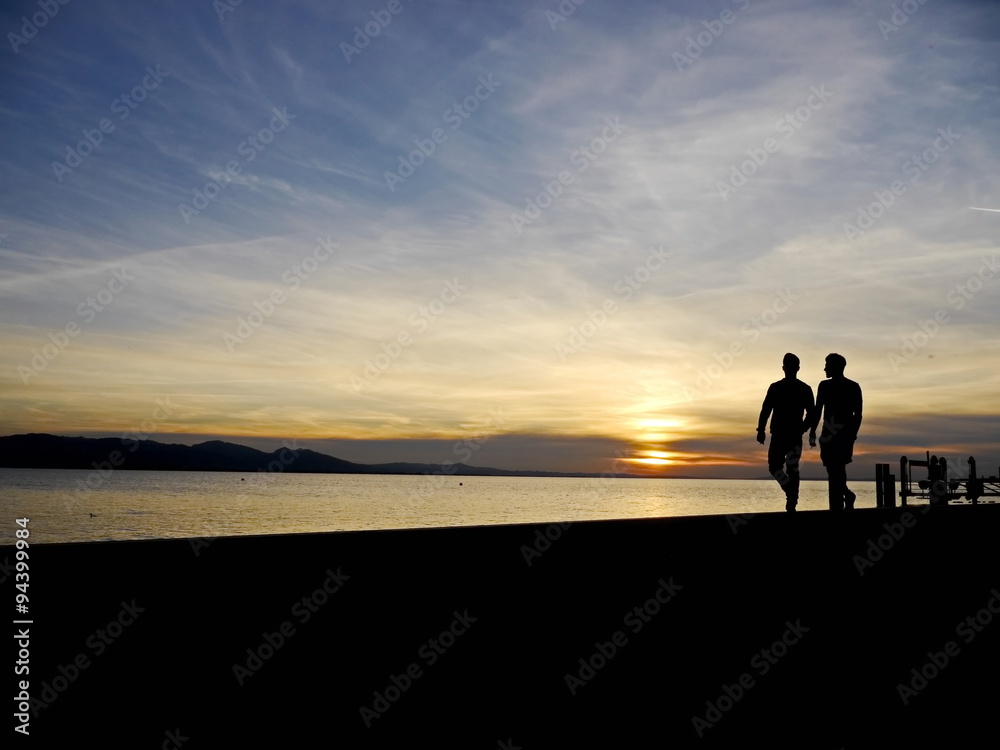 couple walking sunset