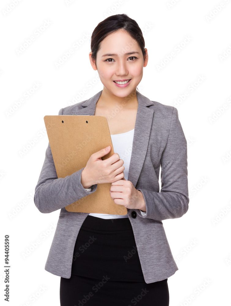 Young businesswoman hold with clipboard