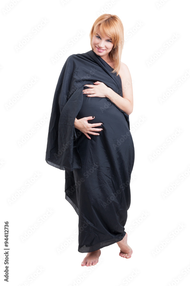 Graceful pregnant woman wearing long black veil as dress