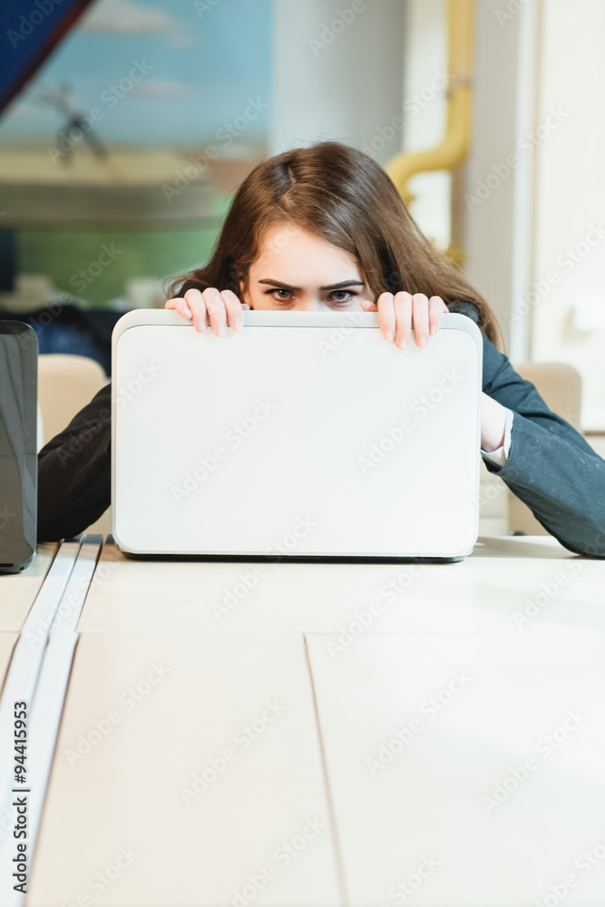 Young businesswoman on a coffee break. Using tablet computer. Young businesswoman on a coffee break. Using tablet computer.