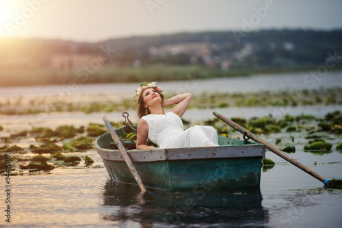 Sexy woman on the boat © Art_man