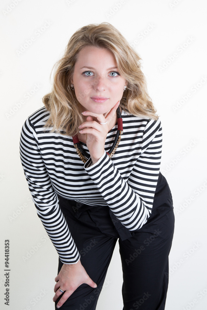 Blond young and sexy woman posing for the camera isolated under white background Blond young and sexy woman posing for the camera isolated under white background