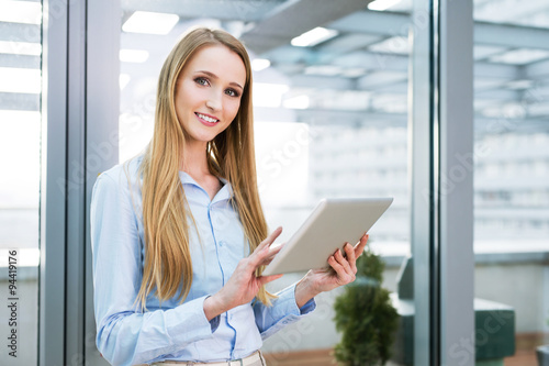 Free Download Young businesswoman with a digital tablet - GFXLoad