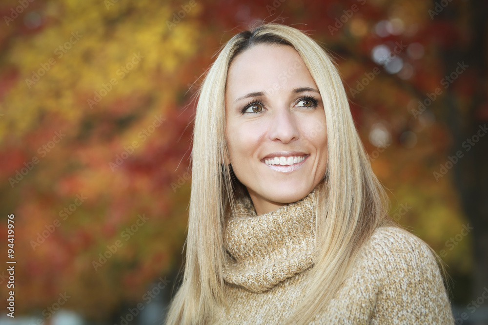 Portrait Of A Mature Woman Smiling And Looking Away