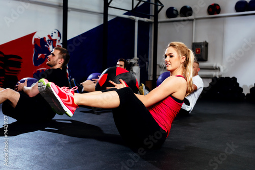 Fitness group training with exercise ball photo