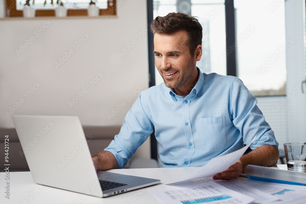 Man working from home on laptop Man working from home on laptop