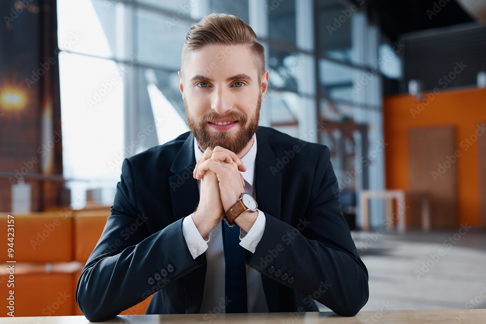 Happy young hipster businessman at modern office Happy young hipster businessman at modern office
