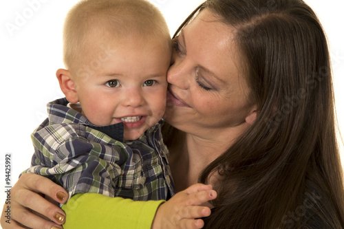 woman and young boy head close photo