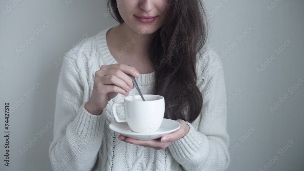 a beautiful woman drinking a beautiful woman drinking