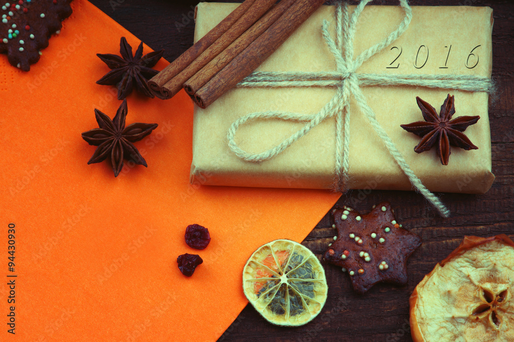 Christmas gift with numbers 2016 and sheet of paper Christmas gift with numbers 2016 and sheet of paper