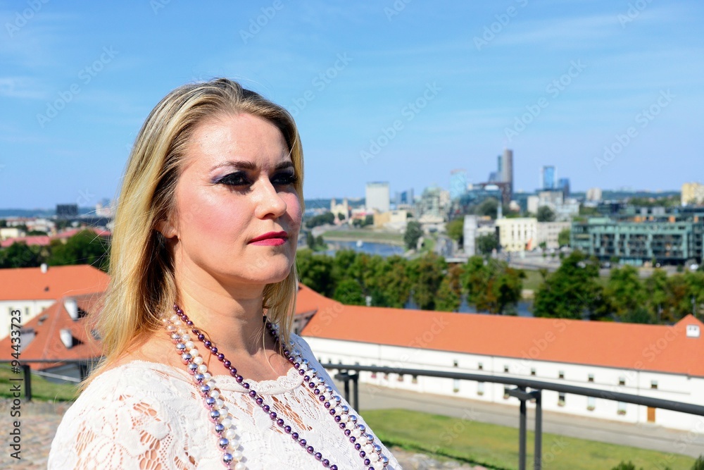 Beautiful girl in Vilnius town on Gediminas castle hill
