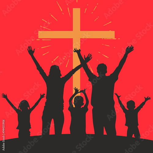 Family with raised hands and a cross