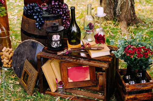Beautiful decor with wine bottles, wooden boxes and other elemen