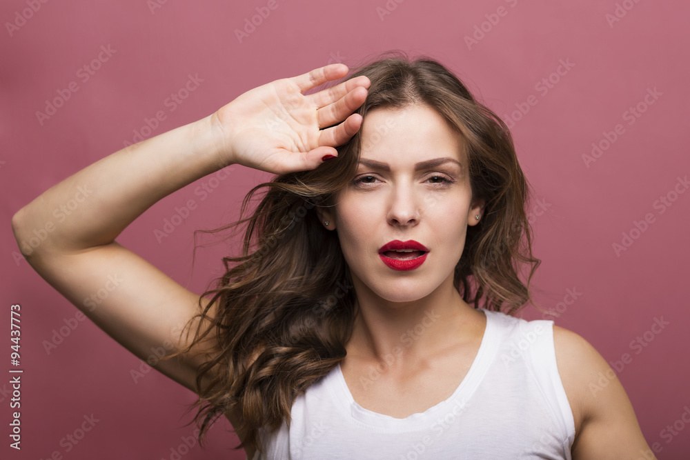 Woman drying her hair Woman drying her hair