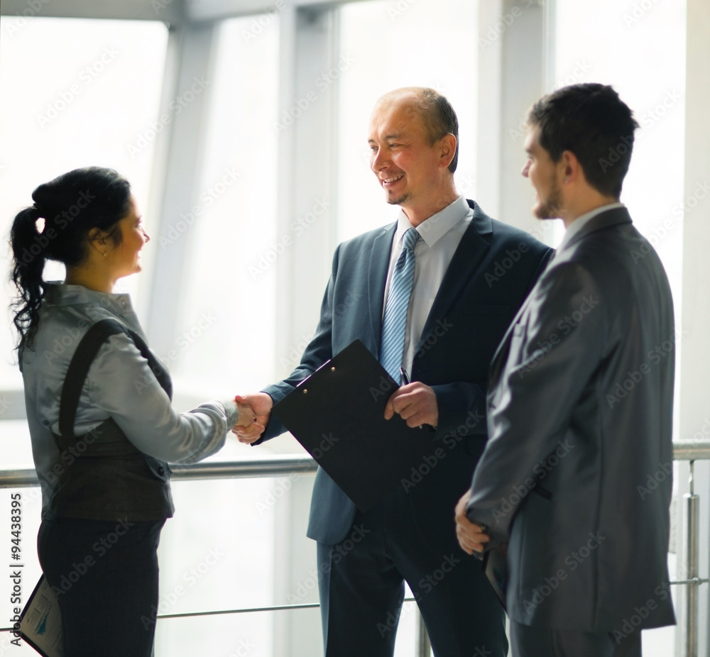 image of a business team discussing the latest financial results image of a business team discussing the latest financial results