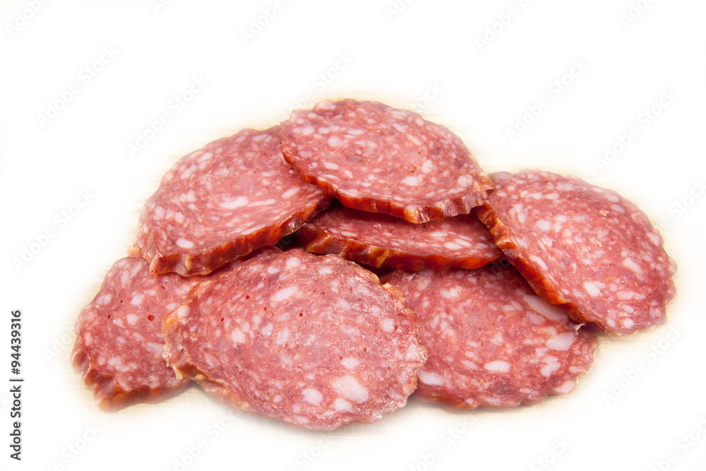 salami sausages on wooden board isolated salami sausages on wooden board isolated