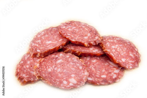 salami sausages on wooden board isolated