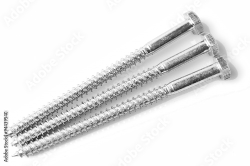 High quality set of three durable hexagonal screws,perfect for any DIY project,captured in a clean and crisp white studio shot.