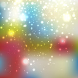 Shining with particles on blurred background