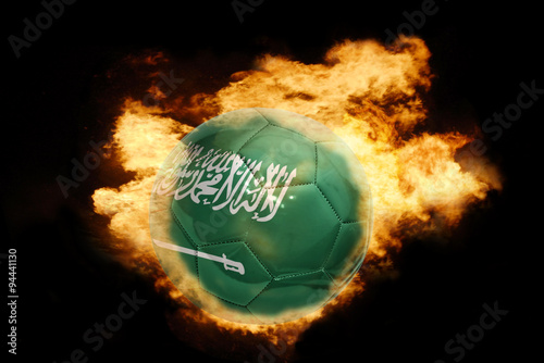 football ball with the flag of saudi arabia on fire