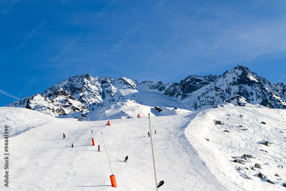 downhill skiing, snow-capped mountains