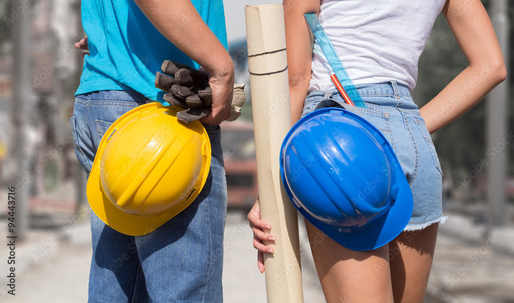 Couple in a construction mode. Couple in a construction mode.