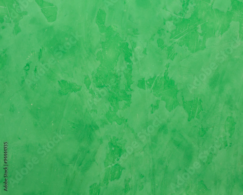 Background of green Venetian plaster.