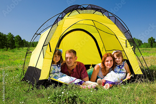 Happy family in the tent