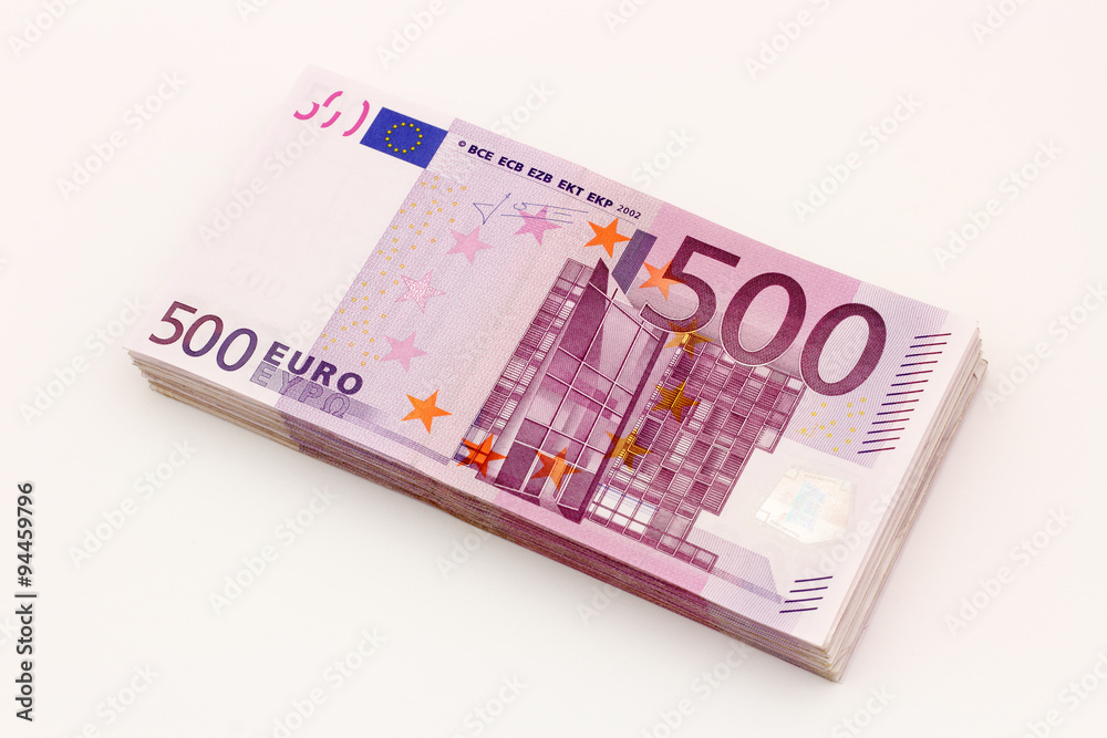 Money - Isolated stack of Five hundred (500) euro bills banknotes with white background Money - Isolated stack of Five hundred (500) euro bills banknotes with white background