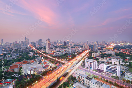 High way x cross Bangkok city business zone ,twilight lighting