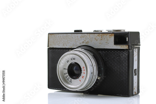 an old camera with no flash on a white isolated background