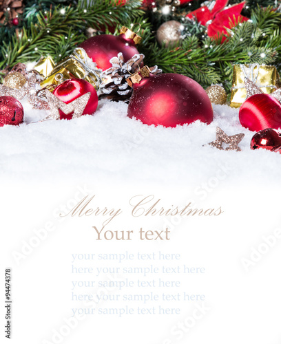 Christmas background with a red ornament on snow, Holiday decoration 