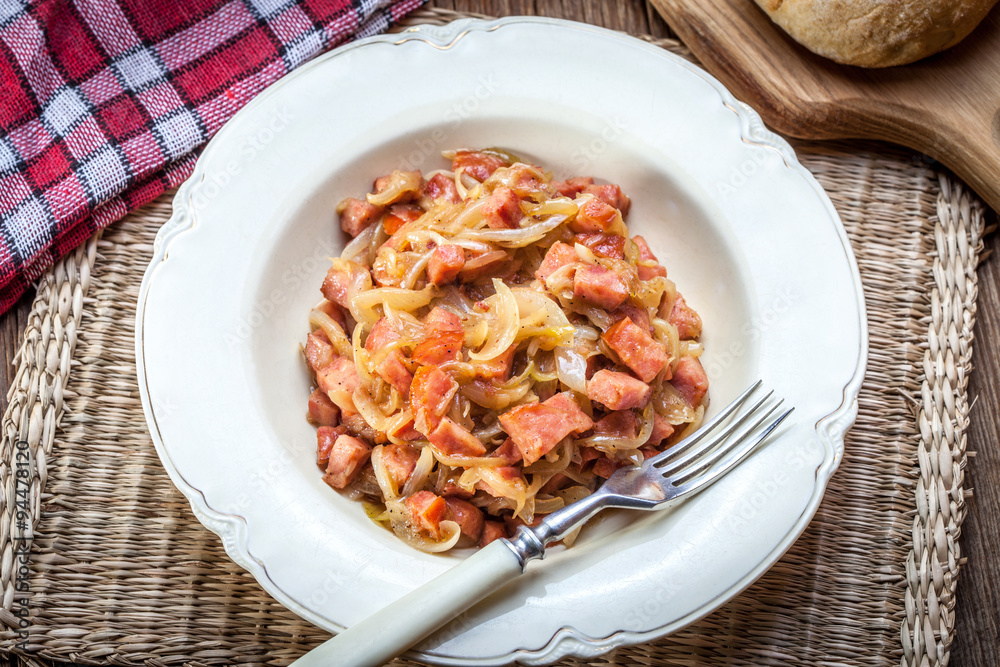 Fototapeta premium Stewed onions with sausage.