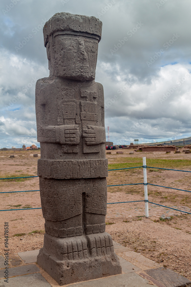 Monolith at Tiwanaku, Altiplano, Titicaca region, Bolivia - One of two large anthropomorphic figures still standing on the Kalasasaya mound. Tiwanaku - ancient city near the Lake Titicaca. Monolith at Tiwanaku, Altiplano, Titicaca region, Bolivia - One of two large anthropomorphic figures still standing on the Kalasasaya mound. Tiwanaku - ancient city near the Lake Titicaca.
