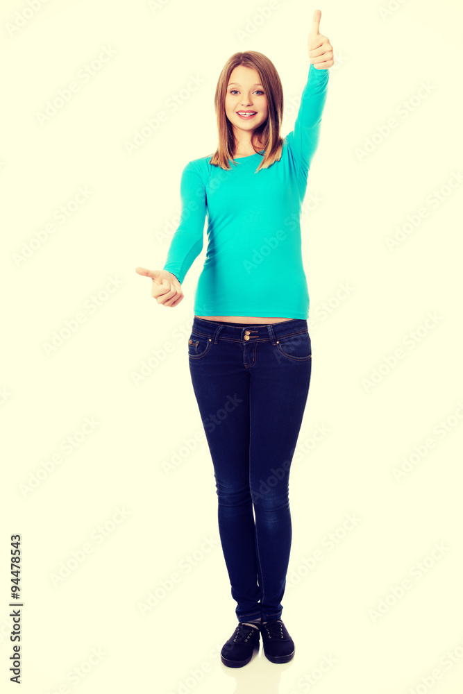 Woman showing thumbs up with both hands Woman showing thumbs up with both hands