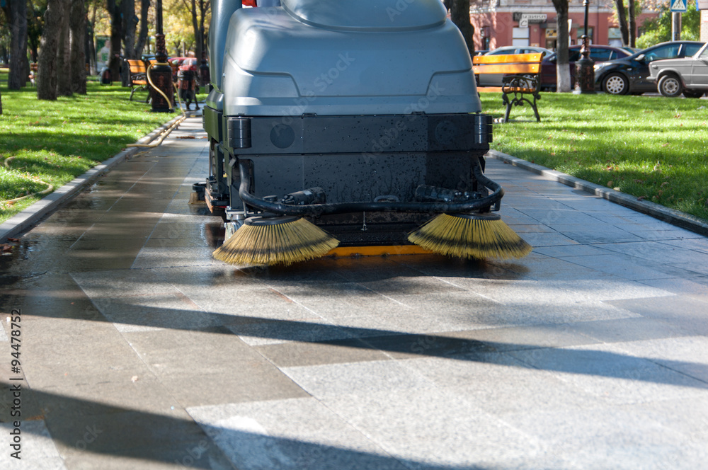 process of cleaning walkways in the Park machine